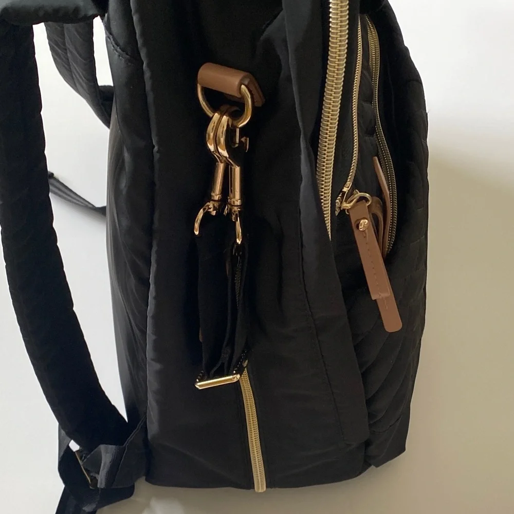 Skip Hop Black Quilted Multifunctional Backpack with Tan and gold accents